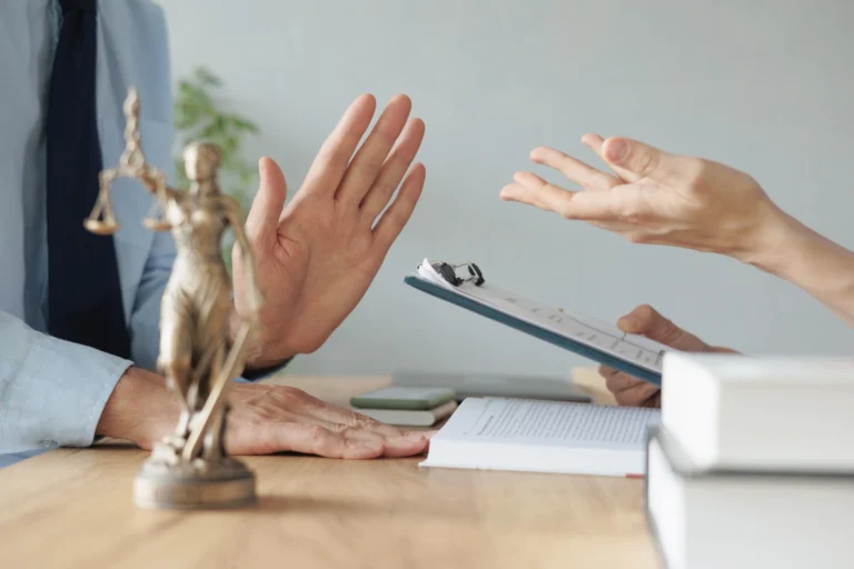 Attorney discussing options to stop a creditor lawsuit with a client in Missouri