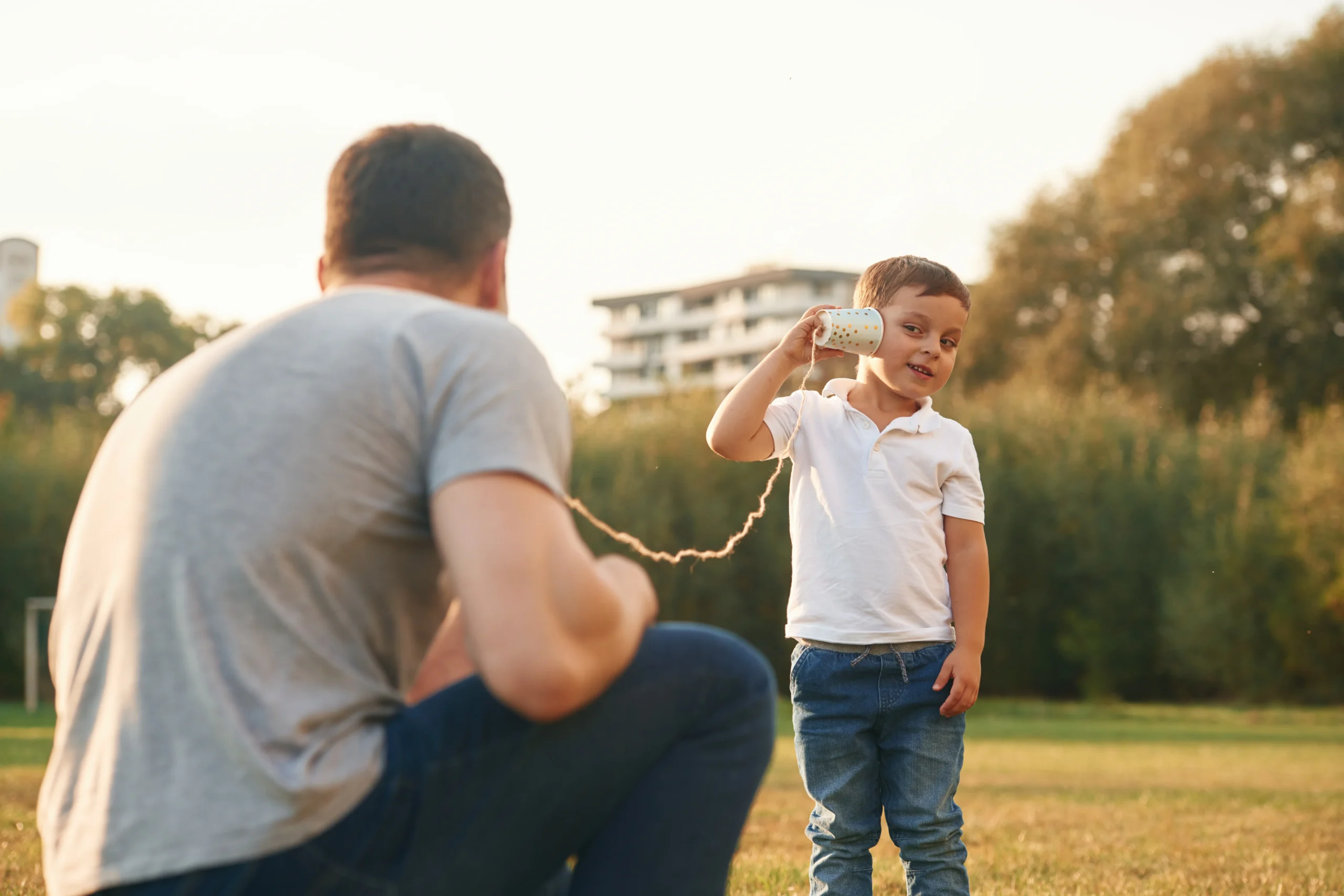 Young boy and father spending time together outdoors, representing Missouri child custody and parenting time